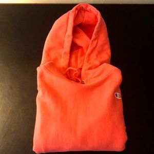 Peach color champion sweater on a size small